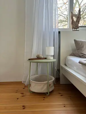 Ein Bett oder Betten in einem Zimmer der Unterkunft Ferienwohnung am Ostpark
