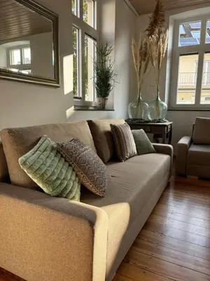 Ein Sitzbereich in der Unterkunft Ferienwohnung am Ostpark