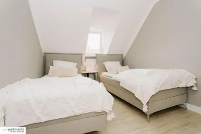Ein Bett oder Betten in einem Zimmer der Unterkunft Top Apartment im Zentrum - youpartments