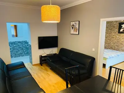Ein Sitzbereich in der Unterkunft Zentrale 3 Zimmerwohnung mit kostenlosem Stellplatz