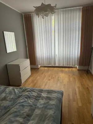 Ein Bett oder Betten in einem Zimmer der Unterkunft Zentrale 3 Zimmerwohnung mit kostenlosem Stellplatz