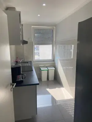 Küche/Küchenzeile in der Unterkunft Zentrale 3 Zimmerwohnung mit kostenlosem Stellplatz
