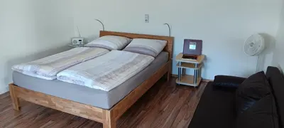 Ein Bett oder Betten in einem Zimmer der Unterkunft Ferienwohnung Unter der Limburg in Bad Dürkheim-Hausen