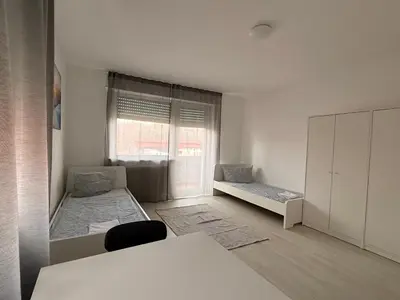 Ein Bett oder Betten in einem Zimmer der Unterkunft Ferienwohnung Rheinglück