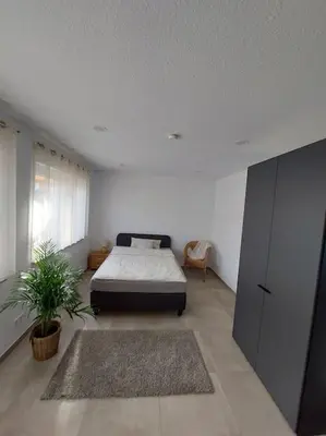 Ein Bett oder Betten in einem Zimmer der Unterkunft Monteurwohnung Ferienwohnung