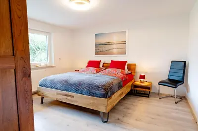 Ein Bett oder Betten in einem Zimmer der Unterkunft Ferienwohnung Sonnenschein