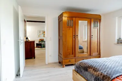 Ein Bett oder Betten in einem Zimmer der Unterkunft Ferienwohnung Sonnenschein