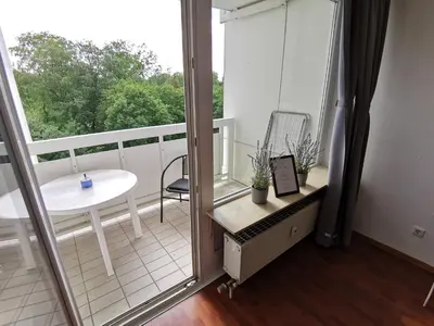 Ein Balkon oder eine Terrasse in der Unterkunft FR14 - Schöne 2-Zimmer-Wohnung mit Balkon in Heusenstamm