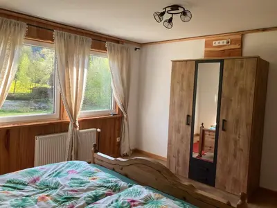 Ein Bett oder Betten in einem Zimmer der Unterkunft Ferienhaus Drei Mühlen