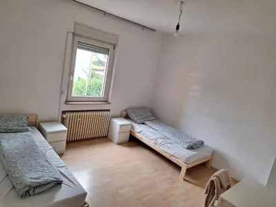 Ein Bett oder Betten in einem Zimmer der Unterkunft Malamin
