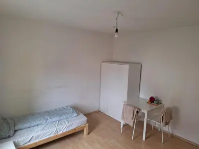 Ein Bett oder Betten in einem Zimmer der Unterkunft Malamin