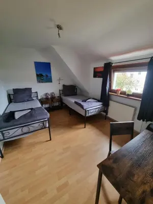 Ein Bett oder Betten in einem Zimmer der Unterkunft Pension Parga