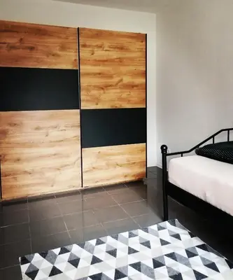 Ein Bett oder Betten in einem Zimmer der Unterkunft Modernes Apartment - Neustadt an der Weinstraße
