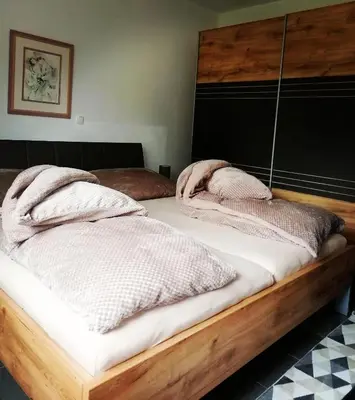 Ein Bett oder Betten in einem Zimmer der Unterkunft Modernes Apartment - Neustadt an der Weinstraße