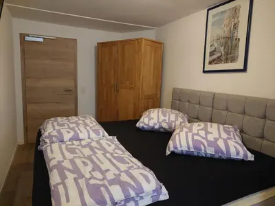 Ein Bett oder Betten in einem Zimmer der Unterkunft Hotel Bruchsal Herz
