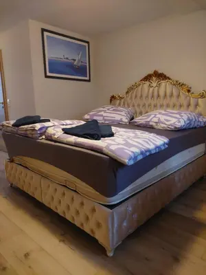 Ein Bett oder Betten in einem Zimmer der Unterkunft Hotel Bruchsal Herz