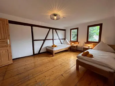 Ein Bett oder Betten in einem Zimmer der Unterkunft Ferienwohnung am Schloss