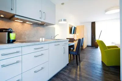Küche/Küchenzeile in der Unterkunft Boardinghouse Rülzheim