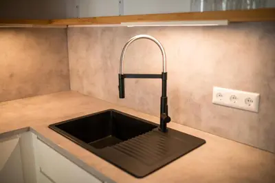 Küche/Küchenzeile in der Unterkunft HUGOS Design Apartment am Waldrand - ruhig & modern