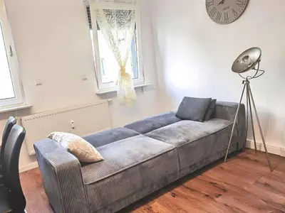 Ein Sitzbereich in der Unterkunft Ein Familie Haus in Zentrale Lage