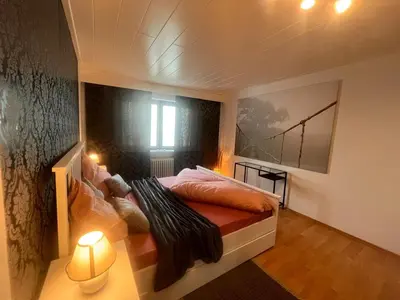 Ein Bett oder Betten in einem Zimmer der Unterkunft Zentrales City Appartement mit Bestlage & gratis Parkplatz