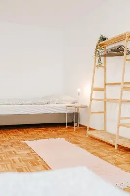 Ein Bett oder Betten in einem Zimmer der Unterkunft namastay! Modernes Wohnen im Herzen von Mannheim