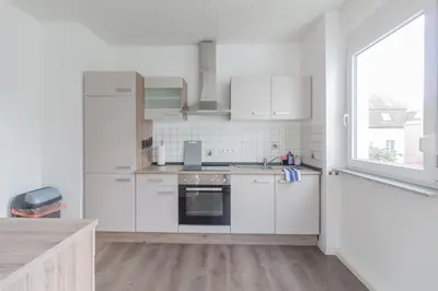 Küche/Küchenzeile in der Unterkunft nJoy! Apartment Heilbronn - Zentral & Garten