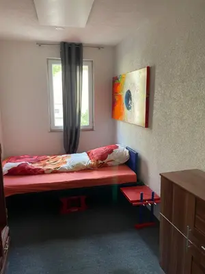 Ein Bett oder Betten in einem Zimmer der Unterkunft Fürsten Zimmer