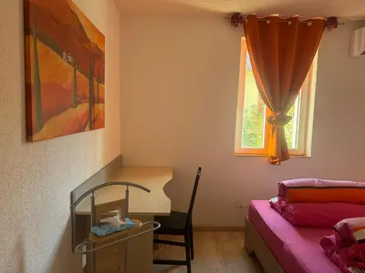 Ein Bett oder Betten in einem Zimmer der Unterkunft Fürsten Zimmer