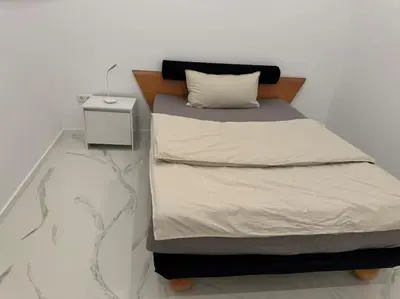 Ein Bett oder Betten in einem Zimmer der Unterkunft Gemütliche Wohnung in Heilbronn