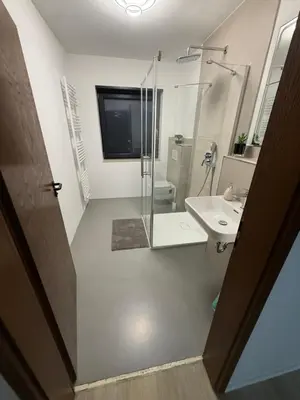 Ein Badezimmer in der Unterkunft VDM Ferienwohung Pfungstadt