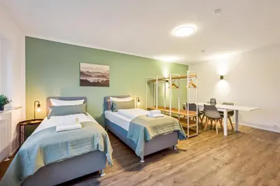 Ein Bett oder Betten in einem Zimmer der Unterkunft Salí Homes Weinblick Beethoven - ruhige Feldlage