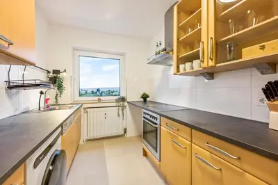 Küche/Küchenzeile in der Unterkunft Salí Homes Weinblick Beethoven - ruhige Feldlage