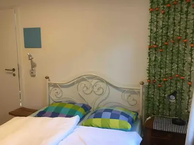 Ein Bett oder Betten in einem Zimmer der Unterkunft Ferienhaus im Wald an der Weinstrasse