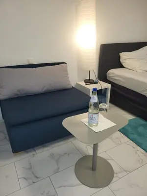 Ein Sitzbereich in der Unterkunft Stilvolle 2-Zimmer-Oase