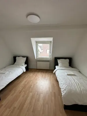 Ein Bett oder Betten in einem Zimmer der Unterkunft Leimen51 Whg2