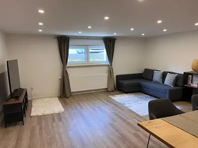 TV/Unterhaltungsangebot in der Unterkunft Neu! Große Ferienwohnung 3 Zimmer mit Küche und Bad, 90 qm mit Netflix und PS5