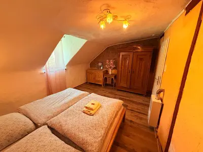 Ein Bett oder Betten in einem Zimmer der Unterkunft Stilvolles City Haus mit 2 Bädern & Parkplatz, 75 qm Innenstadt