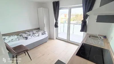 Ein Bett oder Betten in einem Zimmer der Unterkunft Studio Apartments 28