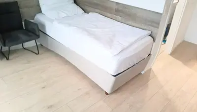 Ein Bett oder Betten in einem Zimmer der Unterkunft Studio Apartments 28