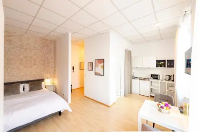Ein Bett oder Betten in einem Zimmer der Unterkunft Galilei Apartment 1