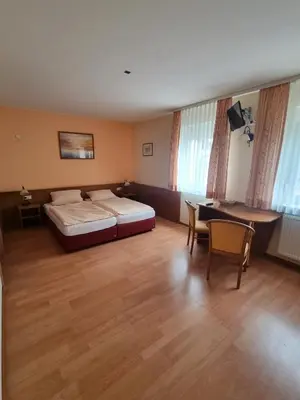 Ein Bett oder Betten in einem Zimmer der Unterkunft Zur Turmstube