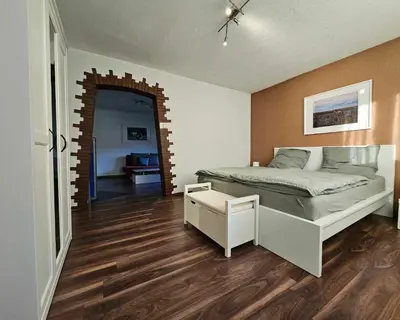 Ein Bett oder Betten in einem Zimmer der Unterkunft Ferienwohnung auf Islandpferdegestüt