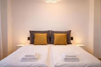 Ein Bett oder Betten in einem Zimmer der Unterkunft Luxus Wohnung am Rand von Stuttgart
