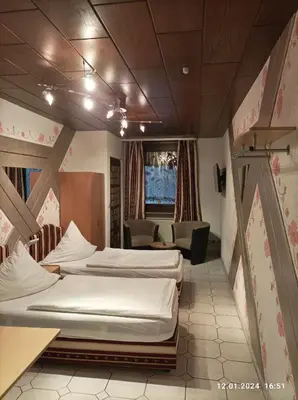 Ein Bett oder Betten in einem Zimmer der Unterkunft Central Hotel