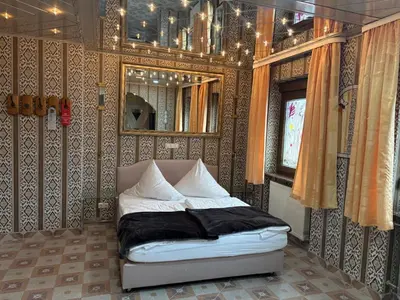 Ein Bett oder Betten in einem Zimmer der Unterkunft Central Hotel