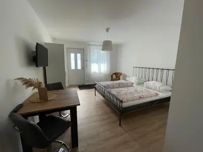 Ein Bett oder Betten in einem Zimmer der Unterkunft Gästezimmer im Weingut Kissel