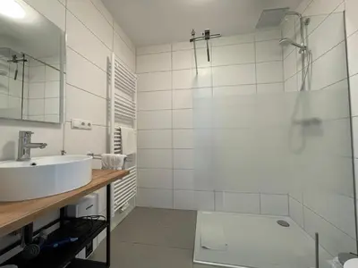 Ein Badezimmer in der Unterkunft Gästezimmer im Weingut Kissel