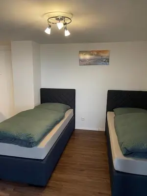 Ein Bett oder Betten in einem Zimmer der Unterkunft Top möblierte Wohnung in Brühl