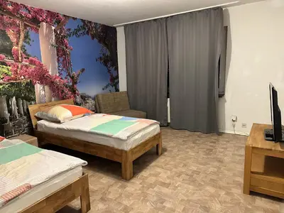 Ein Bett oder Betten in einem Zimmer der Unterkunft Schöne Wohnung 27 B nah Uni Klinik